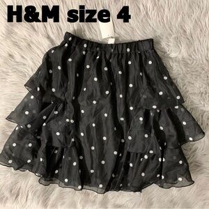 NEW NWT H & M women tired black skirt with white dots , size 4
